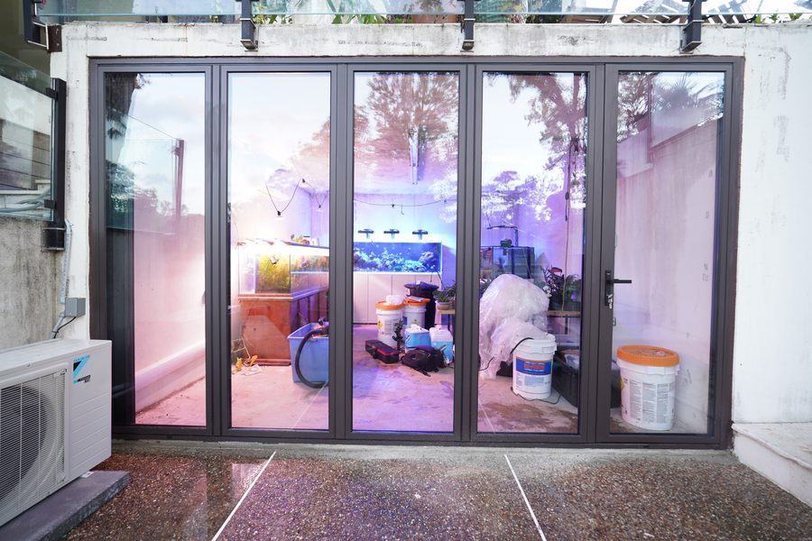 Closed, straight on: five panels and slim sightlines, Houston TX 77056