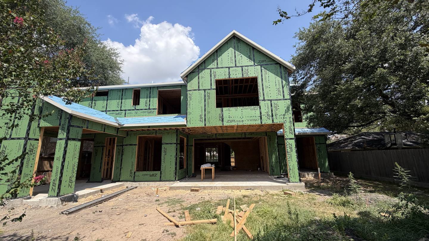 Houston new construction home with rough openings framed and ready for Royal Windoor window installation