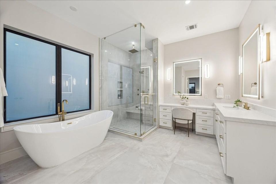 Bathroom tub under a picture window, Royal Windoor installation in Houston