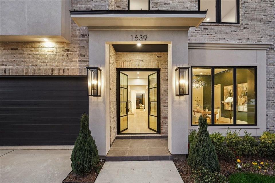 Aluminum entry door on a Houston home, Royal Windoor installation in Houston