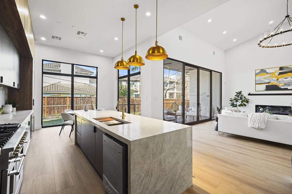 Kitchen with large black-framed glazing