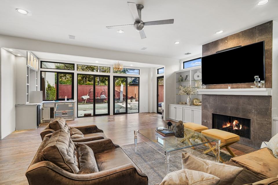 Living room with large fixed and operable glass