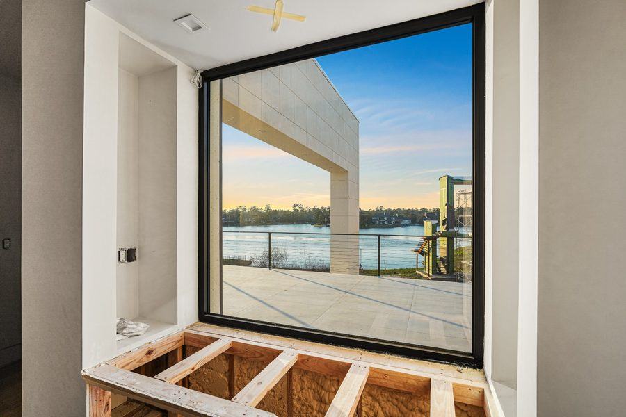 Large fixed window looking over the water, The Woodlands TX 77380