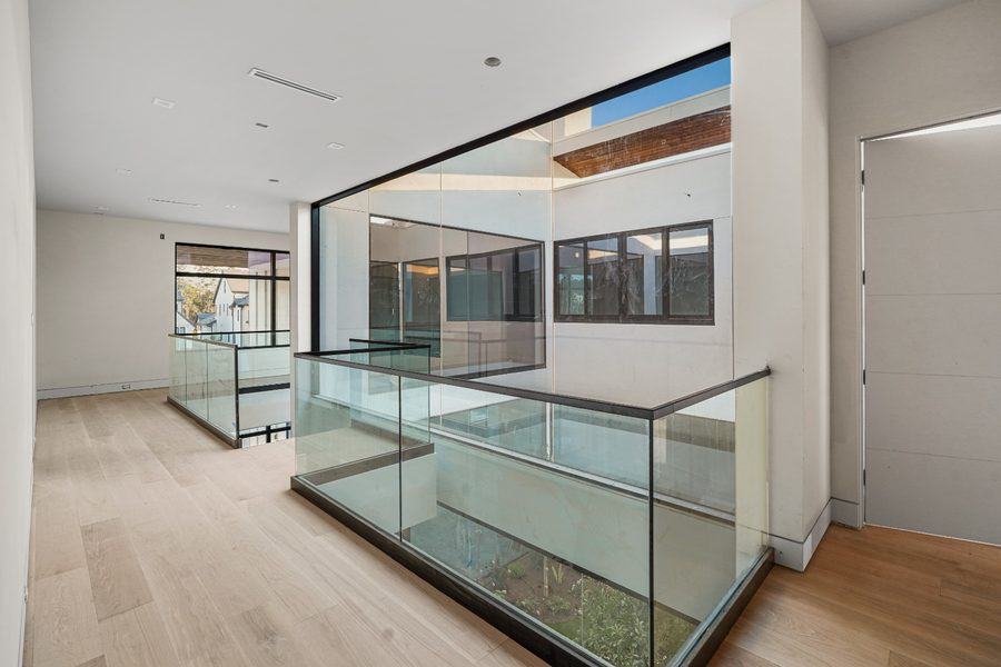 Atrium glass from the upper landing, The Woodlands TX 77380